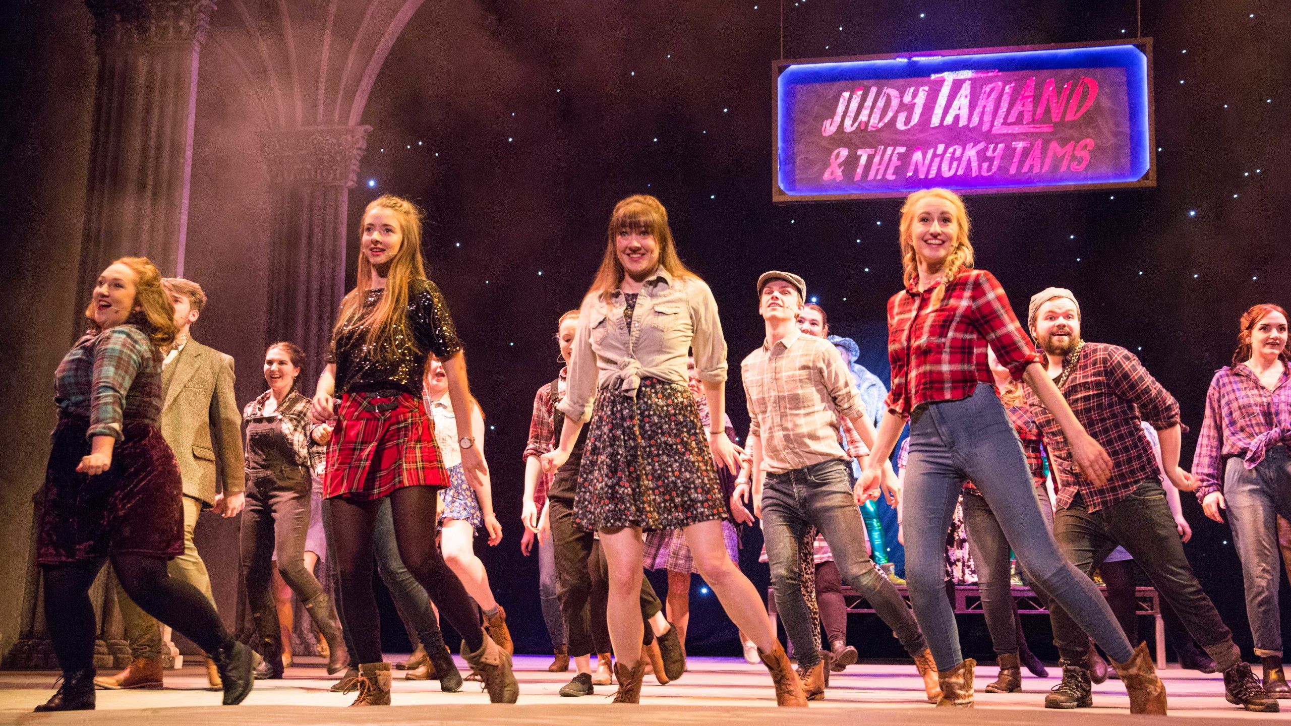 Photo of student show performers on stage.